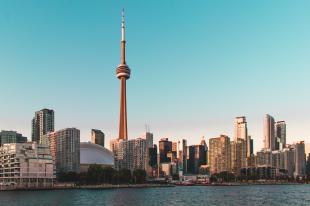 Toronto skyline during the day with blue skies